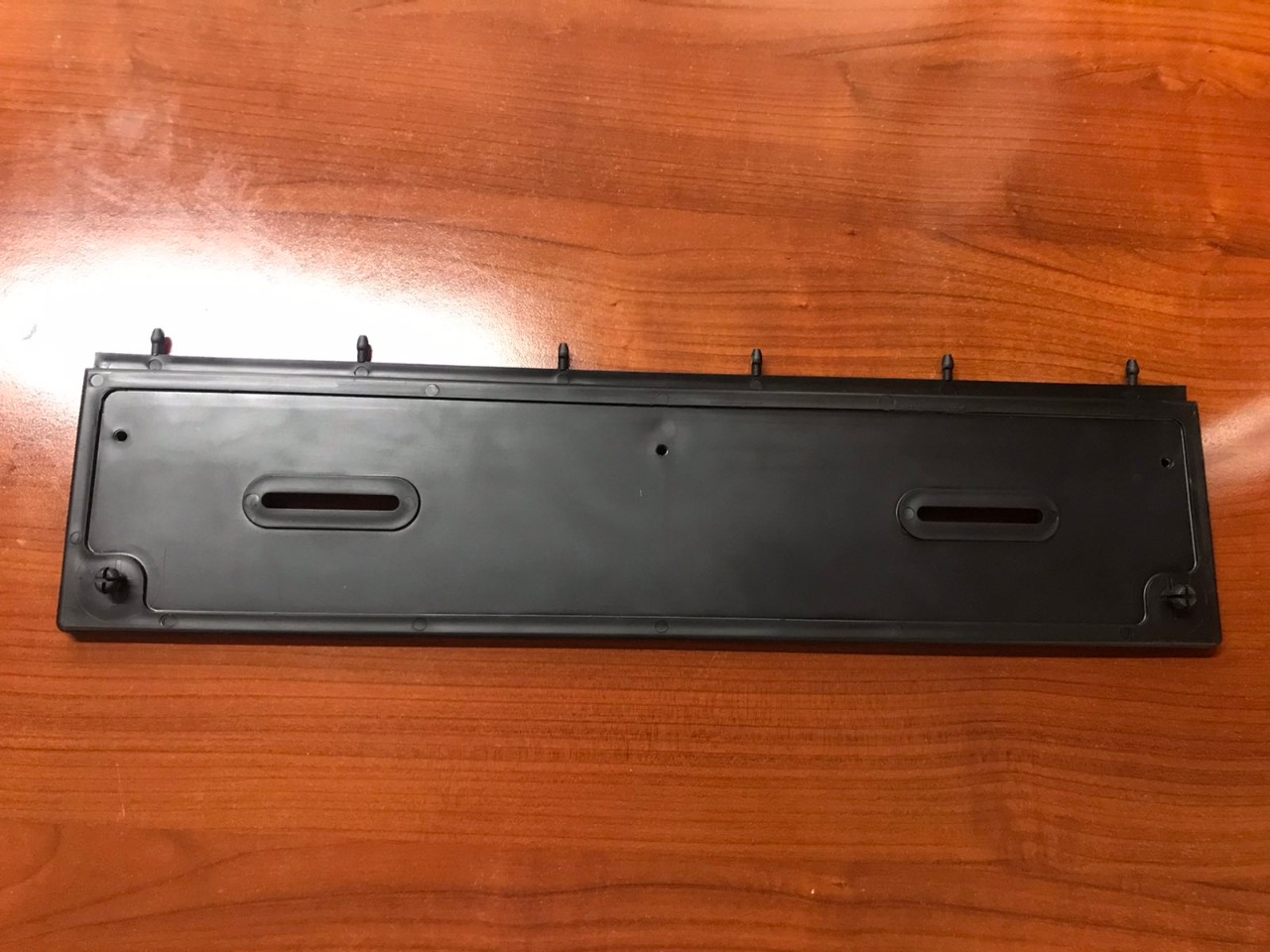 НАКЛАДКА БАМПЕРА ПЕРЕДНЬОГО ПІД НОМЕРНИЙ ЗНАК MAN M2000/F90/M90